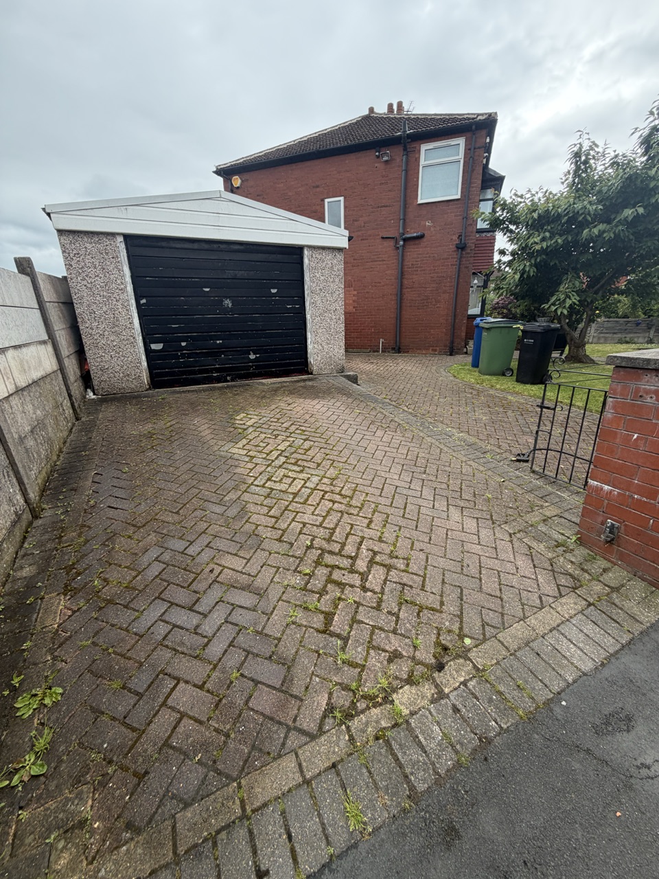 Before – a weed-covered block-paved driveway brought right back to life.
