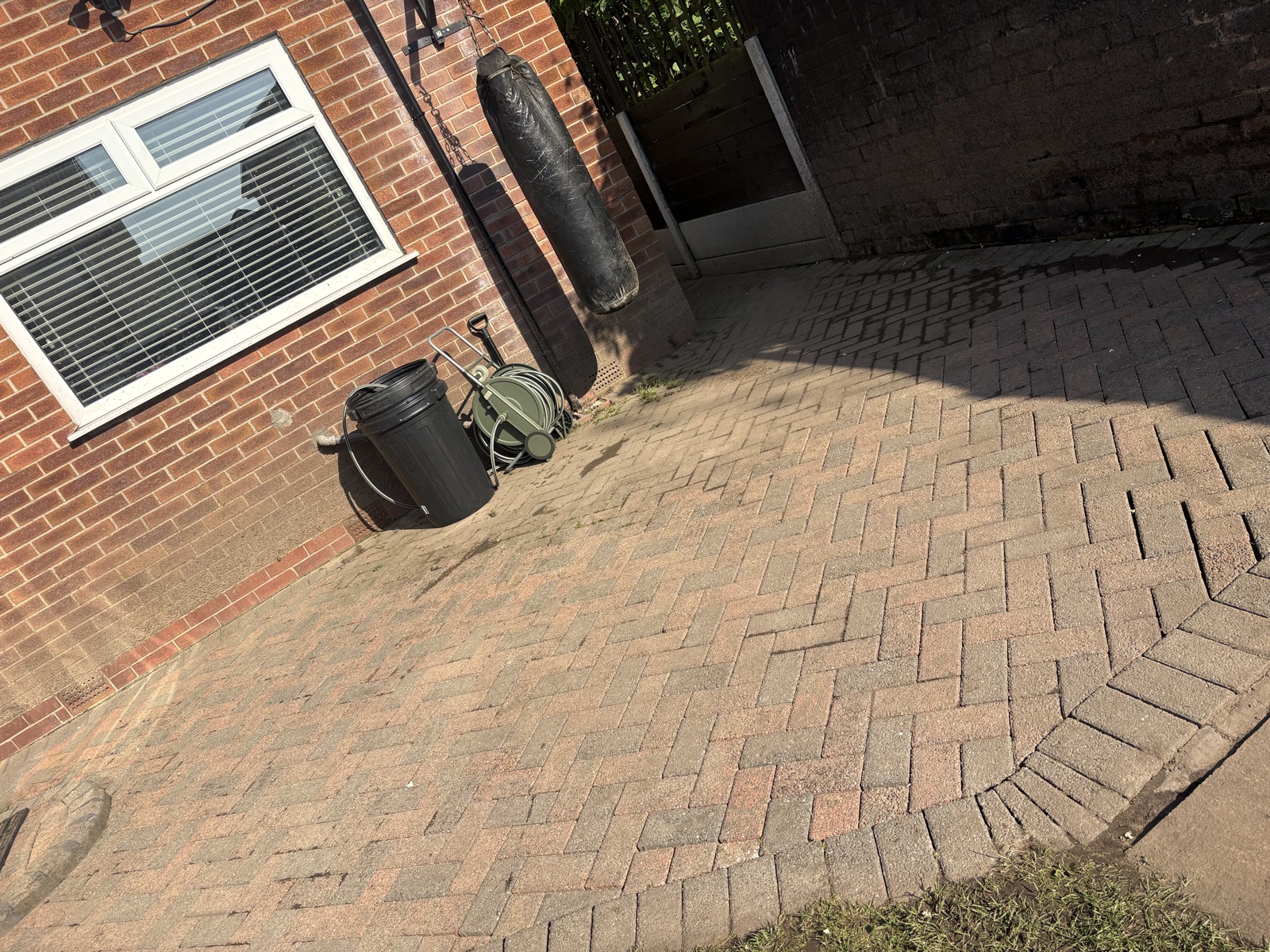 Before – the same surface before pressure washing.